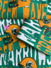 Load image into Gallery viewer, GREEN WAVE HELMET HEADLINE TEE (IN-STOCK)
