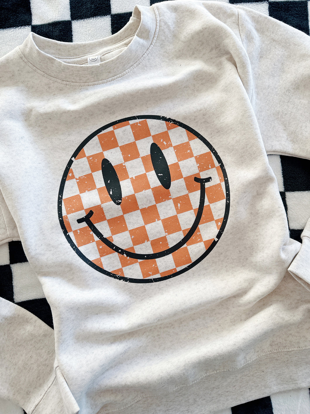 CHECKERBOARD SMILE CREWNECK