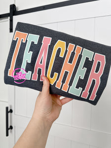 TEACHER RAINBOW VARSITY TEE