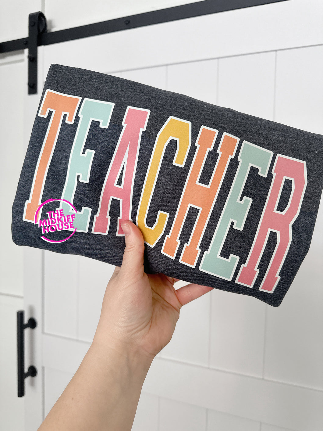 TEACHER RAINBOW VARSITY TEE
