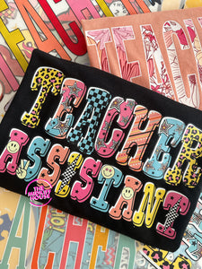 TEACHER ASSISTANT TEE